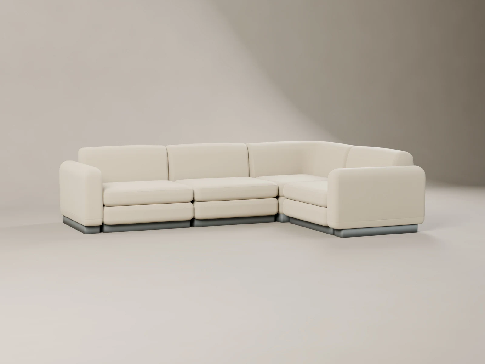 Cream linen modular corner sofa in a neutral studio
